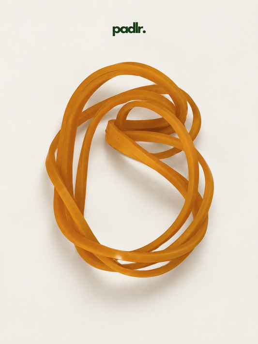 Padlr Sports Science Warm-Up Band, orange latex resistance band on a clean studio background